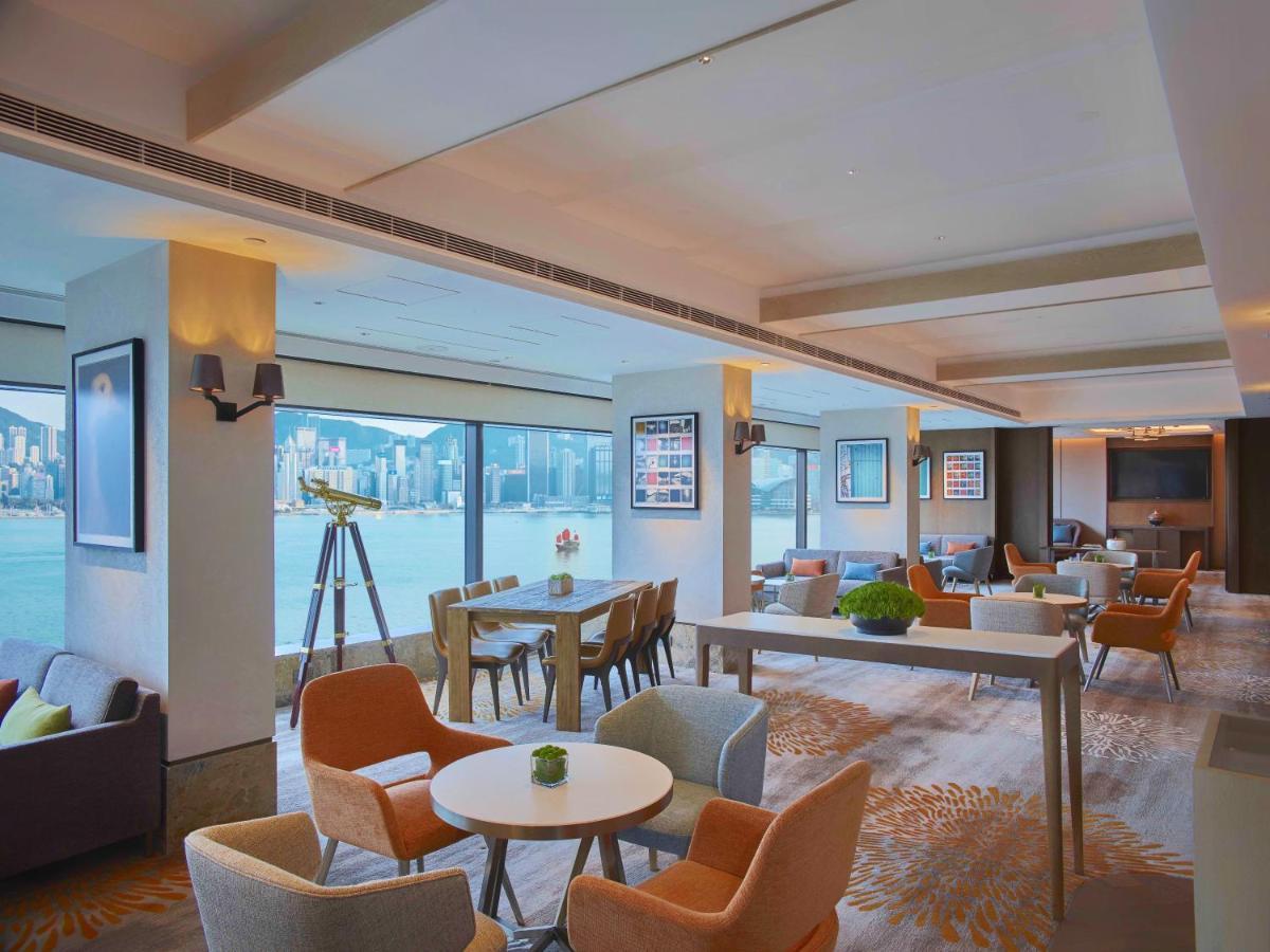 New World Millennium Hong Kong Hotel Exterior photo The Club Lounge at the Hong Kong International Convention and Exhibition Centre