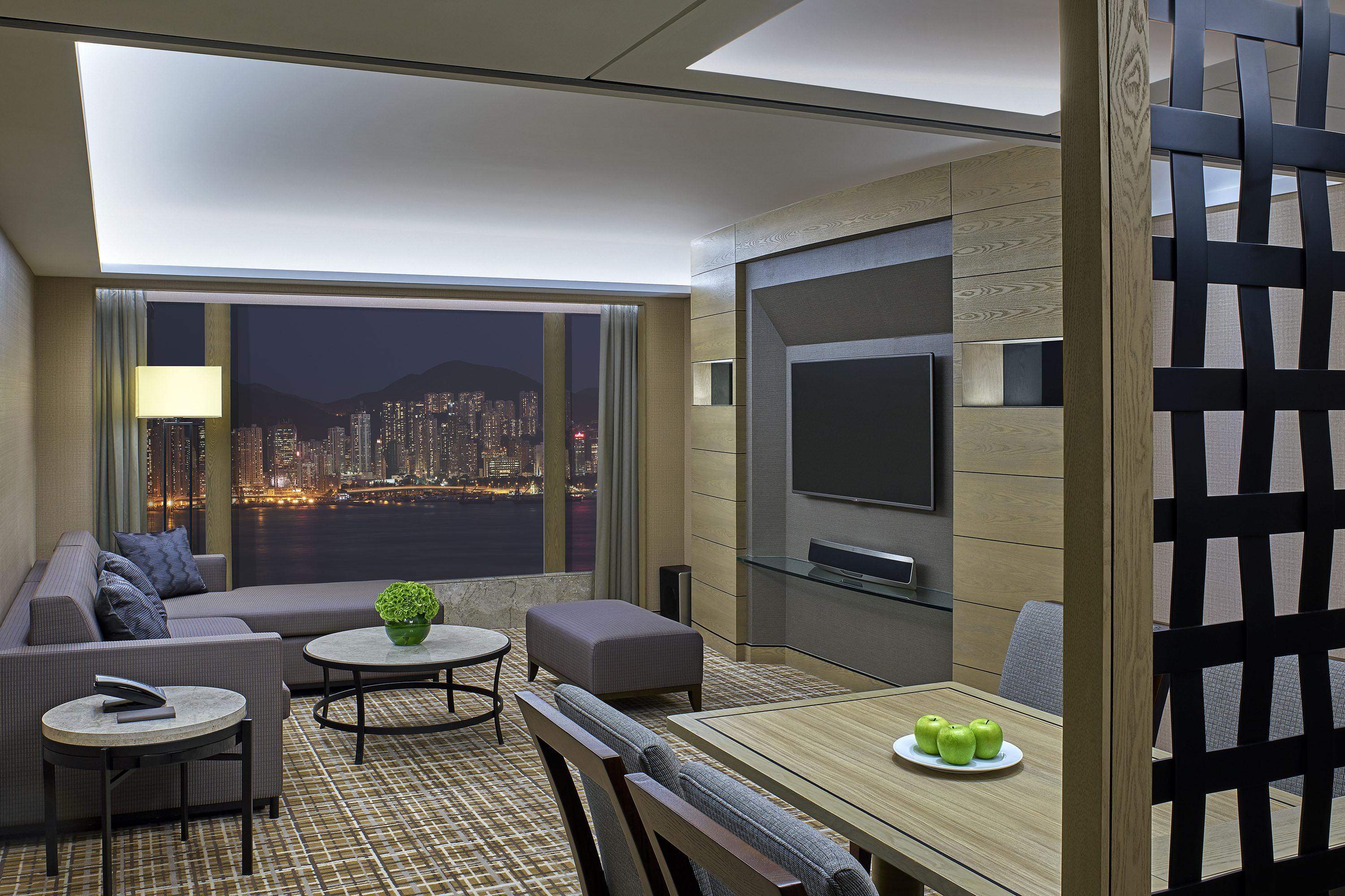 New World Millennium Hong Kong Hotel Exterior photo The living room of a suite at the hotel